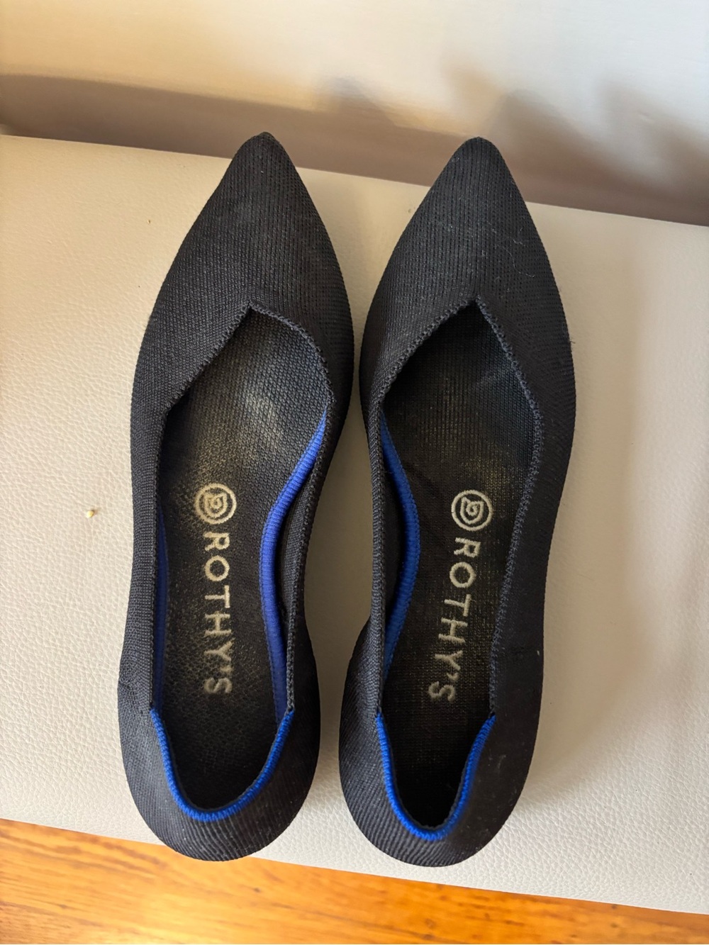 Rothy's Black Pointed Slip-On Flats with Blue Trim